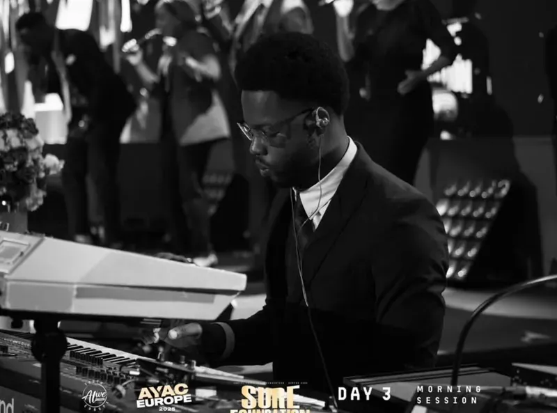 A keyboardist playing during the worship session