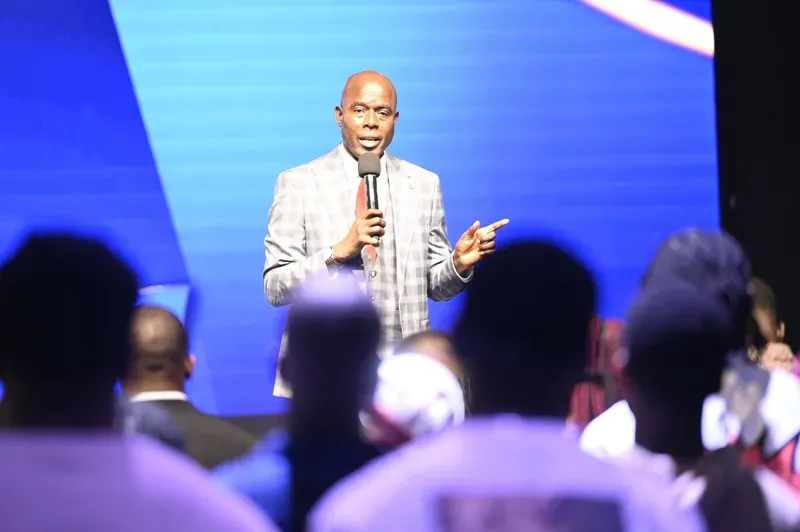 A pastor preaching to the congregation
